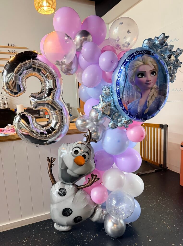 Stack of colorful balloons in one column